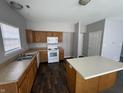 Bright kitchen with wood cabinets, modern appliances, and a convenient center island at 5816 Dollar Forge Dr, Indianapolis, IN 46221