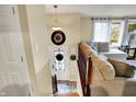 Bright foyer with stylish tile and a view into the adjacent living room at 1218 W Shady Creek Dr, Greenwood, IN 46142