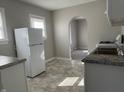 Bright kitchen with modern appliances, and a double sink at 1624 S Jersey Ave, Muncie, IN 47302