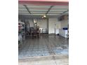 Spacious garage with ample room for storage and parking with epoxy flooring at 203 Village Green Dr, Indianapolis, IN 46227