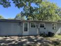 Rear view of home with patio area and vinyl siding at 2905 N Barr St, Muncie, IN 47303