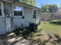 Side and back view of home with AC unit and siding at 2905 N Barr St, Muncie, IN 47303
