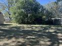 Large grassy backyard featuring chain link fence at 2905 N Barr St, Muncie, IN 47303