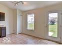Bright eating area with a sliding glass door, adjacent to the kitchen at 3693 Berkdale Dr, Columbus, IN 47203
