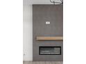Sleek fireplace with a linear design, creating a cozy focal point at 17364 Pinellas Ave, Westfield, IN 46074
