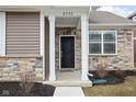 Close-up view of the home's front porch and facade at 2556 Lamar Dr, Whitestown, IN 46075