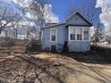Charming home with an inviting entrance and stairs to the front door at 2933 E 56Th St, Indianapolis, IN 46220