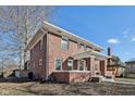 Nice brick home with well-maintained yard, showcasing a classic design with modern upgrades and ample outdoor space at 3645 N Delaware St, Indianapolis, IN 46205