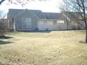 Great backyard with mature trees and well manicured lawn at 515 Bridgestone Dr, Mooresville, IN 46158