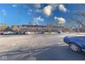 Beautiful brick condo building with scenic views from the spacious parking lot at 5525 Roxbury Ter, Indianapolis, IN 46226