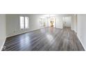 Bright and airy living room with new flooring and ample natural light at 5525 Roxbury Ter, Indianapolis, IN 46226