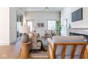 Cozy living room featuring hardwood floors, modern furnishings, and a fireplace at 5537 Broadway St, Indianapolis, IN 46220