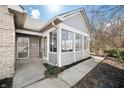 Enclosed patio with glass panels and access to the home at 5721 Quail Crossing Dr, Indianapolis, IN 46237