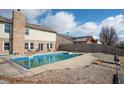 Backyard featuring an in-ground pool and patio area, perfect for outdoor entertaining at 1841 Sonesta Ln, Indianapolis, IN 46217
