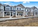 Charming exteriors feature a blend of materials, complementing the well-maintained lawns at 19511 Grassy Branch Rd, Westfield, IN 46074
