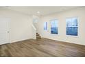 Bright living space with hard wood floors, and plenty of natural light at 19511 Grassy Branch Rd, Westfield, IN 46074