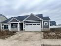 Charming single-story home featuring gray siding, white trim, and an attached two-car garage at 3687 Thomas Jefferson Ct, Westfield, IN 46074