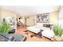 Stylish living room with modern furniture, hardwood floors, and decorative art at 5924 Elaine St, Indianapolis, IN 46224