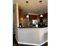 Stylish kitchen featuring a breakfast bar and stainless steel appliances at 14309 Shooting Star Dr, Noblesville, IN 46060