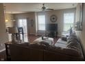Spacious living room featuring hardwood floors, lots of light, modern decor, and comfortable seating at 14309 Shooting Star Dr, Noblesville, IN 46060