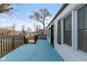 Enjoy the outdoors on the expansive front porch with a blue floor and convenient access at 317 Albany St, Indianapolis, IN 46225