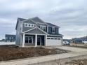 Beautiful two-story home boasting a spacious two-car garage and inviting curb appeal at 3667 Thomas Jefferson St, Westfield, IN 46074