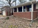 Exterior angle of a brick home with an entry porch and an attached garage at 8328 S Franklin Rd, Indianapolis, IN 46259