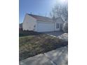 Lovely single-story home with a two-car garage, a well-manicured lawn, and a peaceful neighborhood setting at 10793 Walnut Grove Bnd, Camby, IN 46113