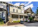 Attractive home with a covered front porch, lush landscaping, and prominent signage at 1471 N Delaware St, Indianapolis, IN 46202