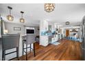 Bright, updated kitchen features white cabinets, stainless steel appliances, and modern lighting fixtures at 2305 Bill Smith Rd, Martinsville, IN 46151