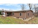 Exterior view of home with durable siding, complemented by a well-manicured lawn and rock landscaping at 2387 Bill Smith Rd, Martinsville, IN 46151