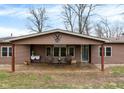 Home exterior showcasing a spacious covered porch, perfect for relaxing outdoors at 2387 Bill Smith Rd, Martinsville, IN 46151