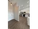 Bright kitchen boasts stainless steel appliances and white cabinets at 2418 Shorewood Dr, Lebanon, IN 46052