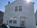 A two-story house with white siding, an air conditioning unit and a glass sliding door to the backyard at 6647 Black Antler Cir, Indianapolis, IN 46217
