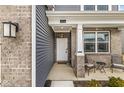 Inviting entryway with covered front porch at 6713 Cardiff Dr, McCordsville, IN 46055