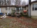 Backyard featuring a wooden deck with gardening supplies at 8 Lake Hart, Mooresville, IN 46158