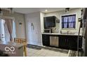 Functional kitchen space with stainless steel appliances, stylish cabinets, and natural light at 102 Azalea Dr, Mooresville, IN 46158