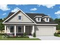 Charming single-Gathering home showcasing a traditional design with a two-car garage and well-manicured lawn at 14383 Coyote Ridge Dr, Noblesville, IN 46060