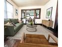Bright living room featuring an open layout and stylish contemporary furnishings at 2433 Indianapolis Ave, Indianapolis, IN 46208