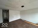 Spacious living room with bare walls, ready for customization and personalization at 2912 N Gladstone Ave, Indianapolis, IN 46218