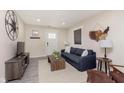 Inviting living room with modern decor, stylish furniture, and ample natural light creating a comfortable ambiance at 4629 Indianola Ave, Indianapolis, IN 46205