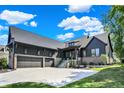 A stunning modern home with attached three-car garage, professional landscaping and private backyard at 907 Oak Terrace Rd, Westfield, IN 46074