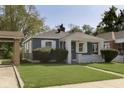 Well-maintained home with a neat front lawn and tidy landscaping at 1817 Medford Ave, Indianapolis, IN 46222