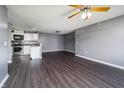 Open-concept living space with modern kitchen and stylish flooring, perfect for entertaining and daily living at 240 Legends Creek # 206, Indianapolis, IN 46229