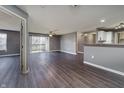 Open-concept floor plan integrates living area, balcony access, and modern kitchen, perfect for contemporary living at 240 Legends Creek # 206, Indianapolis, IN 46229