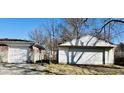 This image shows a detached garage in need of repair and some updates at 260 W 33Rd St, Indianapolis, IN 46208