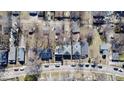 Overhead view of homes in a quiet residential area featuring mature trees, providing a serene atmosphere at 2839 E 19Th St, Indianapolis, IN 46218