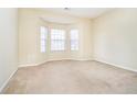 Sunlit bedroom with neutral walls, carpet flooring, and a large bay window that allows plenty of natural light at 3509 Heathcliff Ct, Westfield, IN 46074