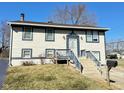 Charming two-story home with a well-maintained lawn and inviting curb appeal at 4144 Richelieu Rd, Indianapolis, IN 46226