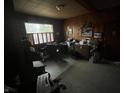 The home office features paneled walls and a window at 721 Stover Ave, Indianapolis, IN 46227